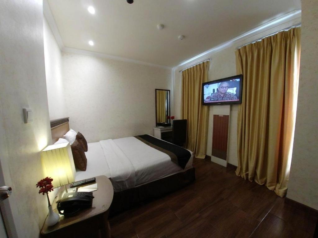Amos Cozy Hotel Melawai Jakarta Eksteriør bilde