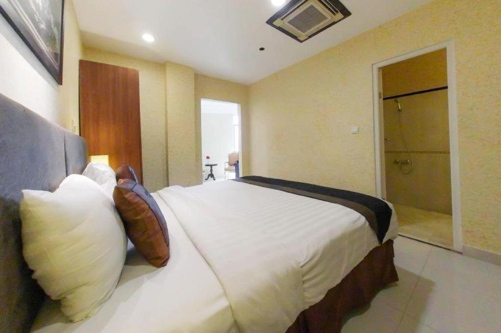 Amos Cozy Hotel Melawai Jakarta Eksteriør bilde